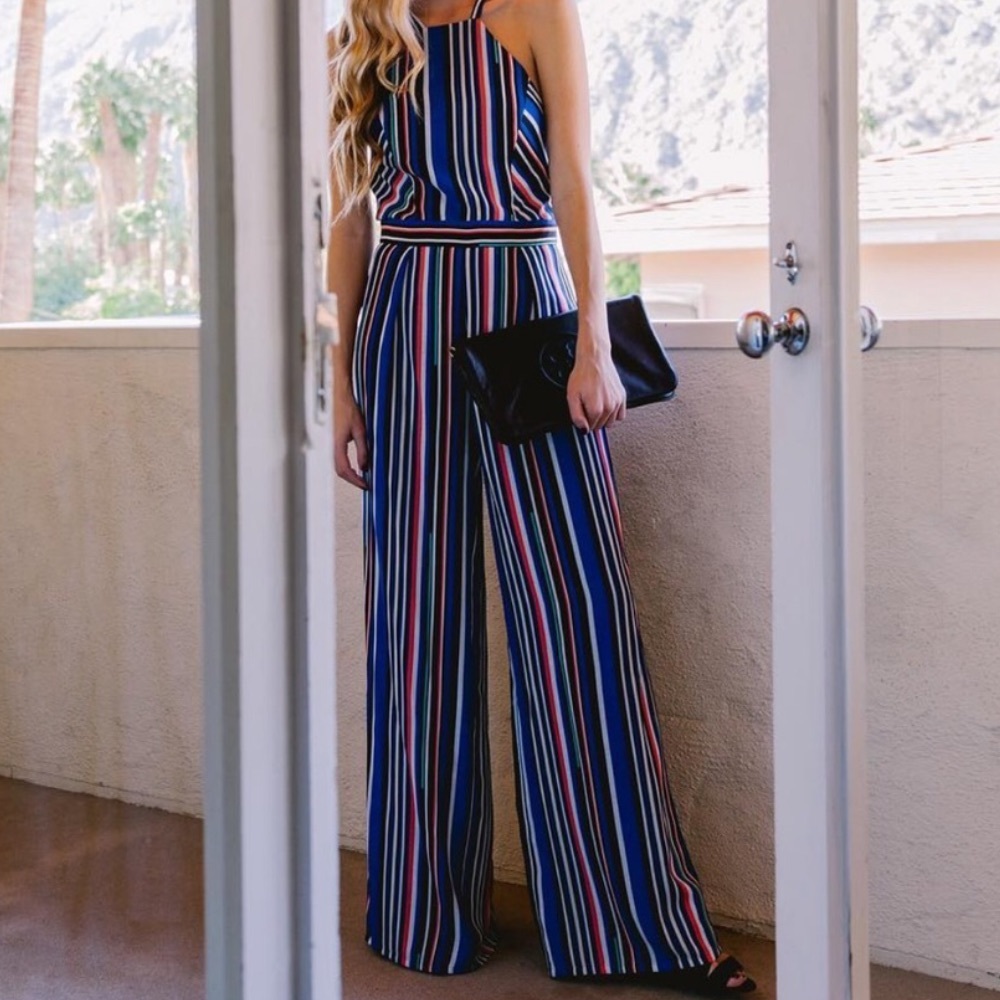 Like new Bebe Blue Striped Jumpsuit size 4